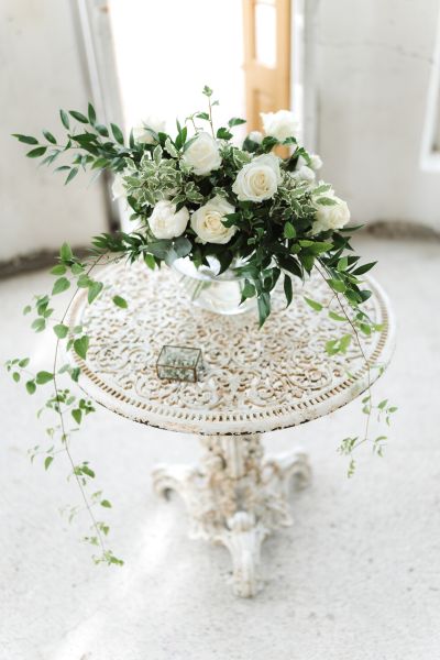 kukkakimppu pydll Oitbackan kartano